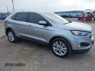 ✅ 2022 Ford Edge Titanium • VIN: 2FMPK4K99NBA41529 • Lot: 43242264. Listed on IAAI with 82,323 mi. Free auction sales archive from the USA and detailed vehicle history report at DreamBid. Image 1.