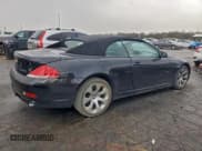 ✅ 2005 BMW 6 Series 645Ci • VIN: WBAEK73405B325215 • Лот: 93490225. Опубликован ранее на Copart с пробегом 127 369 миль. Бесплатный доступ к архиву аукционных продаж из США и подробный отчёт об истории автомобиля на DreamBid. Изображение 3.