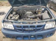 ✅ 2002 Isuzu Rodeo S • VIN: 4S2CK58W124320988 • Lot: 41921874. Wystawiony na IAAI z przebiegiem 227 320 mil. Bezpłatny archiwum sprzedaży aukcyjnych z USA i szczegółowy raport historii pojazdu na DreamBid. Zdjęcie 10.