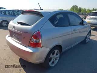 2009 Hyundai Accent Auto SE z VIN KMHCN36C19U109733, wystawiony jako IAAI lot #43153389 z przebiegiem 107 788 mil mil oraz . Historia ofert i sprzedaży dostępna na DreamBid. Obrazek 4.