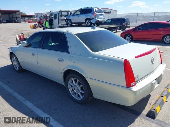 ✅ 2010 Cadillac DTS 1SC • VIN: 1G6KD5EY1AU105099 • Lot: 43325154. Listed on IAAI with 43,421 mi. Free auction sales archive from the USA and detailed vehicle history report at DreamBid. Image 3.