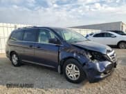 ✅ 2006 Honda Odyssey EX • VIN: 5FNRL38466B123593 • Lot: 82507595. Listed on Copart with 117,859 mi. Free auction sales archive from the USA and detailed vehicle history report at DreamBid. Image 4.