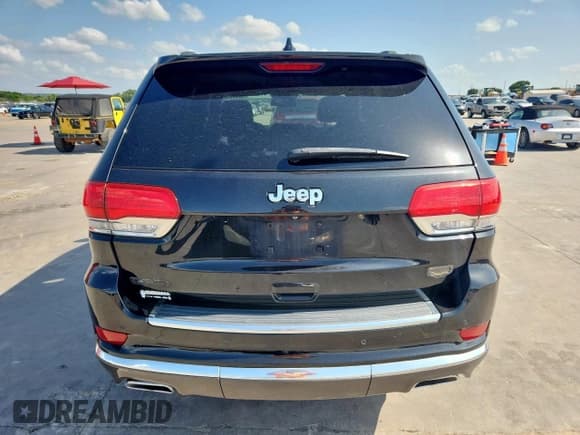 ✅ 2014 Jeep Grand Cherokee • VIN: 1C4RJEJMXEC585632 • Lot: 62036515. Listed on Copart with 148,660 mi. Free auction sales archive from the USA and detailed vehicle history report at DreamBid. Image 6.