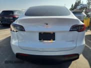 ✅ 2022 Tesla Model Y Long Range • VIN: 7SAYGDEEXNF328595 • Lot: 91732035. Listed on Copart with 41,690 mi. Free auction sales archive from the USA and detailed vehicle history report at DreamBid. Image 6.