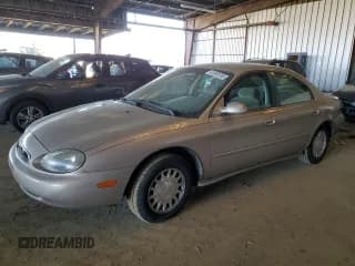 ✅ 1999 Mercury Sable GS • VIN: 1MEFM50U3XG629301 • Lot: 43005265. Listed on Copart with 89,128 mi. Free auction sales archive from the USA and detailed vehicle history report at DreamBid. Image 1.