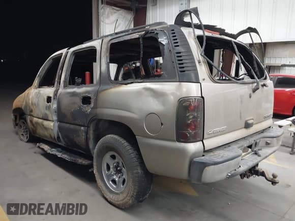 ✅ 2003 Chevrolet Tahoe LS • VIN: 1GNEC13V73R290903 • Lot: 42473491. Listed on IAAI with Not provided. Free auction sales archive from the USA and detailed vehicle history report at DreamBid. Image 3.