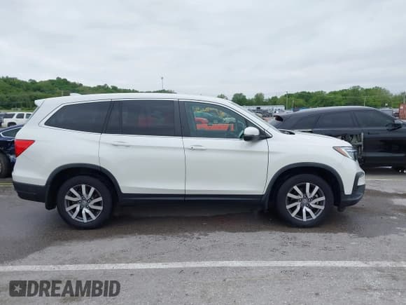 ✅ 2019 Honda Pilot EX-L • VIN: 5FNYF6H54KB054278 • Лот: 42163927. Опубликован ранее на IAAI с пробегом 41 254 миль. Бесплатный доступ к архиву аукционных продаж из США и подробный отчёт об истории автомобиля на DreamBid. Изображение 13.