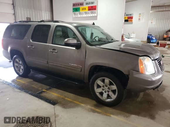 ✅ 2012 GMC Yukon XL SLT • VIN: 1GKS2KE74CR256764 • Lot: 63197125. Listed on Copart with 209,616 mi. Free auction sales archive from the USA and detailed vehicle history report at DreamBid. Image 4.