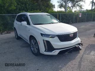 ✅ 2025 Cadillac XT6 FWD Premium Luxury • VIN: 1GYKPCRS7SZ115990 • Lot: 42822268. Wystawiony na IAAI z przebiegiem 8 216 mil. Bezpłatny archiwum sprzedaży aukcyjnych z USA i szczegółowy raport historii pojazdu na DreamBid. Zdjęcie 1.