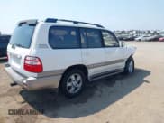 ✅ 2003 Toyota Land Cruiser • VIN: JTEHT05J732046635 • Lot: 42999962. Listed on IAAI with 263,143 mi. Free auction sales archive from the USA and detailed vehicle history report at DreamBid. Image 4.