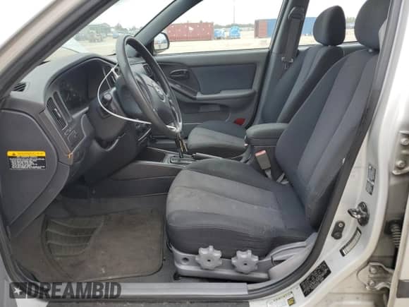2005 Hyundai Elantra GLS z VIN KMHDN56D65U136462, wystawiony jako Copart lot #79910974 z przebiegiem 146 142 mil mil oraz Czysty tytuł • Clean title. Historia ofert i sprzedaży dostępna na DreamBid. Obrazek 7.