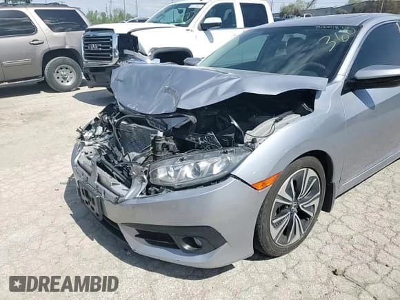 ✅ 2017 Honda Civic EX-T • VIN: 2HGFC1F32HH634475 • Лот: 50001824. Опубликован ранее на Copart с пробегом 132 043 миль. Бесплатный доступ к архиву аукционных продаж из США и подробный отчёт об истории автомобиля на DreamBid. Изображение 10.