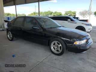 1996 Chevrolet Caprice 1SA Special Value z VIN 1G1BL52P2TR162969, wystawiony jako Copart lot #64120355 z przebiegiem 157 218 mil mil oraz Szkoda całkowita • Salvage title. Historia ofert i sprzedaży dostępna na DreamBid. Obrazek 4.
