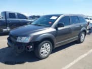✅ 2014 Dodge Journey SE • VIN: 3C4PDCAB5ET182518 • Lot: 43214035. Listed on IAAI with 125,020 mi. Free auction sales archive from the USA and detailed vehicle history report at DreamBid. Image 2.