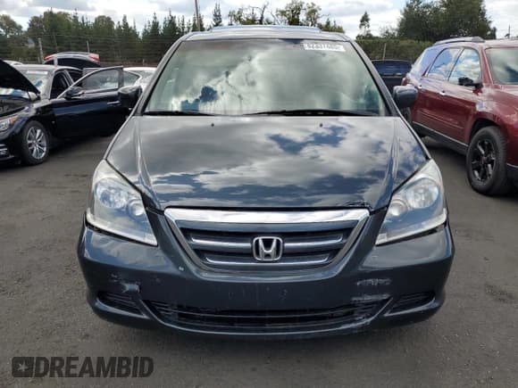 ✅ 2006 Honda Odyssey EX-L • VIN: 5FNRL38756B433972 • Lot: 82337485. Wystawiony na Copart z przebiegiem 228 949 mil. Bezpłatny archiwum sprzedaży aukcyjnych z USA i szczegółowy raport historii pojazdu na DreamBid. Zdjęcie 5.