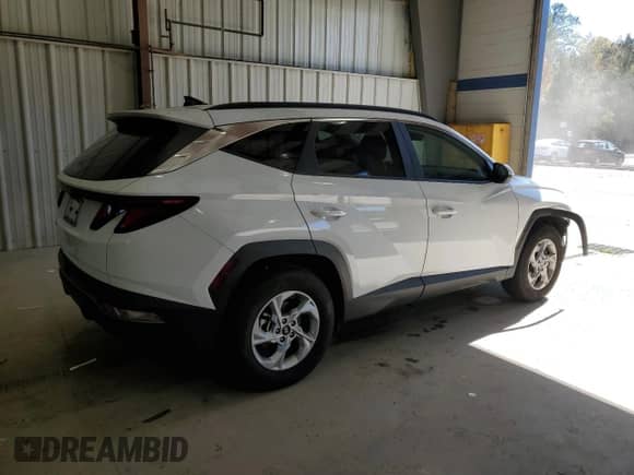 2024 Hyundai Tucson SEL with VIN 5NMJBCDE2RH341838, listed as a Copart auction lot 86464695 with 21,704 mi miles and Salvage title. Bid and sale history available at DreamBid. Image 3.