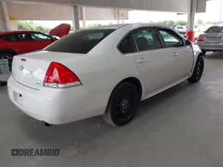 2014 Chevrolet Impala Police Police with VIN 2G1WD5E36E1133932, listed as a IAAI auction lot 42588380 with 174,405 mi miles and . Bid and sale history available at DreamBid. Image 4.
