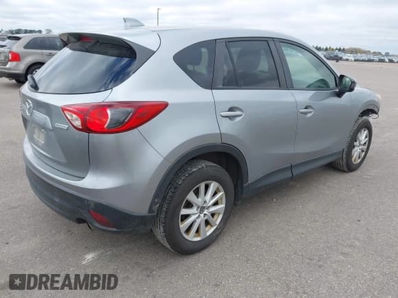 ✅ 2014 Mazda CX-5 Touring • VIN: JM3KE4CY4E0380252 • Lot: 43510717. Wystawiony na IAAI z przebiegiem 207 051 mil. Bezpłatny archiwum sprzedaży aukcyjnych z USA i szczegółowy raport historii pojazdu na DreamBid. Zdjęcie 4.