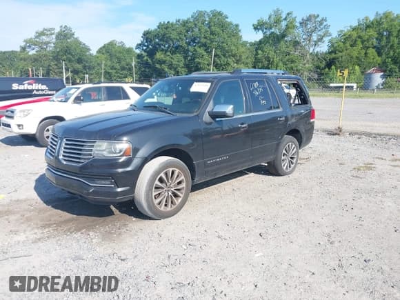 ✅ 2015 Lincoln Navigator • VIN: 5LMJJ2HT1FEJ02021 • Lot: 42613100. Listed on IAAI with 172,944 mi. Free auction sales archive from the USA and detailed vehicle history report at DreamBid. Image 2.