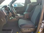 ✅ 2023 Toyota Tacoma TRD Off Road • VIN: 3TYCZ5AN0PT165987 • Lot: 90329665. Listed on Copart with 24,860 mi. Free auction sales archive from the USA and detailed vehicle history report at DreamBid. Image 7.