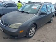 ✅ 2005 Ford Focus SE • VIN: 1FAFP36N15W154138 • Lot: 43392661. Listed on IAAI with 229,591 mi. Free auction sales archive from the USA and detailed vehicle history report at DreamBid. Image 17.