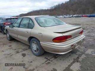 ✅ 1995 Pontiac Bonneville SE • VIN: 1G2HX52K5S4285062 • Lot: 41918224. Wystawiony na IAAI z przebiegiem 100 660 mil. Bezpłatny archiwum sprzedaży aukcyjnych z USA i szczegółowy raport historii pojazdu na DreamBid. Zdjęcie 3.