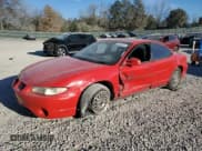 ✅ 1999 Pontiac Grand Prix GTP • VIN: 1G2WR5218XF202213 • Lot: 83345284. Listed on Copart with 215,907 mi. Free auction sales archive from the USA and detailed vehicle history report at DreamBid. Image 1.
