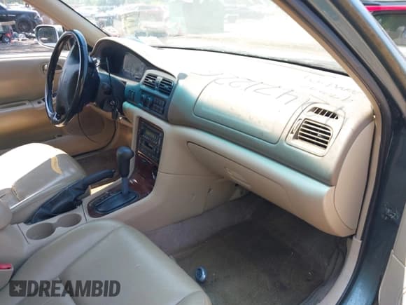 ✅ 1999 Mazda 626 ES • VIN: 1YVGF22C1X5836200 • Lot: 42471226. Listed on IAAI with 84,844 mi. Free auction sales archive from the USA and detailed vehicle history report at DreamBid. Image 5.