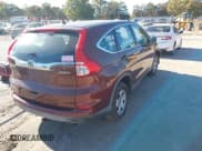 ✅ 2015 Honda CR-V LX • VIN: 5J6RM4H31FL068570 • Lot: 43581601. Listed on IAAI with 235,484 mi. Free auction sales archive from the USA and detailed vehicle history report at DreamBid. Image 4.