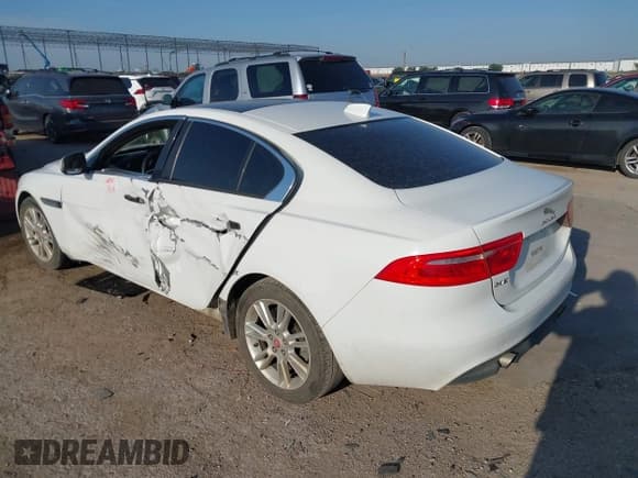 ✅ 2017 Jaguar XE 25t Premium • VIN: SAJAD4BG0HA957939 • Лот: 42340907. Опубликован ранее на IAAI с пробегом 99 448 миль. Бесплатный доступ к архиву аукционных продаж из США и подробный отчёт об истории автомобиля на DreamBid. Изображение 3.