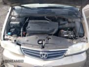 ✅ 2003 Honda Odyssey EX-L • VIN: 5FNRL18083B014534 • Лот: 42802671. Опубликован ранее на IAAI с пробегом 286 686 миль. Бесплатный доступ к архиву аукционных продаж из США и подробный отчёт об истории автомобиля на DreamBid. Изображение 10.