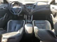 ✅ 2013 Hyundai Veloster Turbo • VIN: KMHTC6AE9DU143461 • Lot: 77618224. Wystawiony na Copart z przebiegiem 180 663 mil. Bezpłatny archiwum sprzedaży aukcyjnych z USA i szczegółowy raport historii pojazdu na DreamBid. Zdjęcie 8.