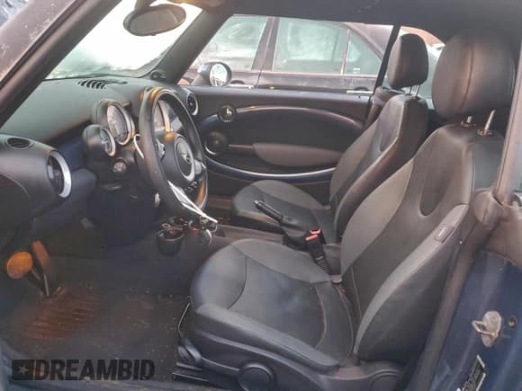 ✅ 2010 MINI Convertible • VIN: WMWMR3C59ATU97143 • Lot: 94448275. Listed on Copart with 73,173 mi. Free auction sales archive from the USA and detailed vehicle history report at DreamBid. Image 7.