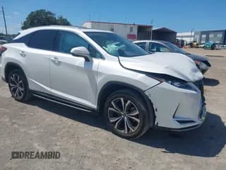 ✅ 2020 Lexus RX 350 • VIN: 2T2HZMAA5LC180685 • Lot: 43216960. Listed on IAAI with 34,273 mi. Free auction sales archive from the USA and detailed vehicle history report at DreamBid. Image 1.