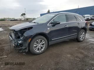 ✅ 2022 Cadillac XT5 AWD Premium Luxury • VIN: 1GYKNDR41NZ159274 • Lot: 55457335. Wystawiony na Copart z przebiegiem 21 439 mil. Bezpłatny archiwum sprzedaży aukcyjnych z USA i szczegółowy raport historii pojazdu na DreamBid. Zdjęcie 1.