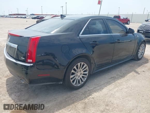 ✅ 2013 Cadillac CTS Performance • VIN: 1G6DJ5E34D0103574 • Lot: 43077955. Listed on IAAI with 185,739 mi. Free auction sales archive from the USA and detailed vehicle history report at DreamBid. Image 4.