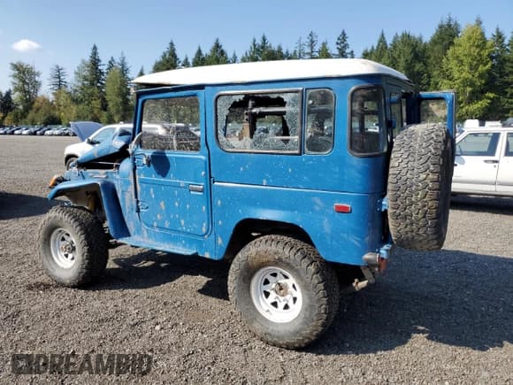 ✅ 1977 Toyota Land Cruiser • VIN: FJ40246486 • Lot: 80190035. Listed on Copart with 23,805 mi. Free auction sales archive from the USA and detailed vehicle history report at DreamBid. Image 2.