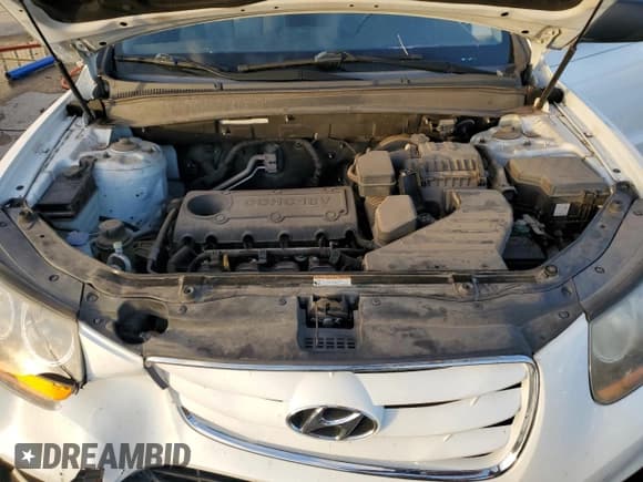 ✅ 2010 Hyundai Santa Fe GLS • VIN: 5NMSG3AB6AH402502 • Lot: 76736364. Listed on Copart with 113,425 mi. Free auction sales archive from the USA and detailed vehicle history report at DreamBid. Image 12.