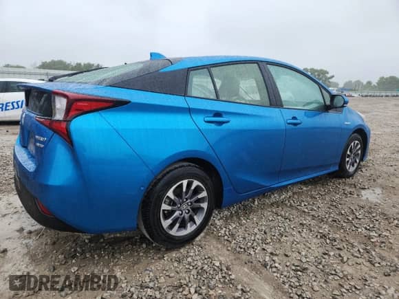 2021 Toyota Prius L Eco with VIN JTDKAMFU6M3145619, listed as a Copart auction lot 60266185 with 43,256 mi miles and Salvage title. Bid and sale history available at DreamBid. Image 3.