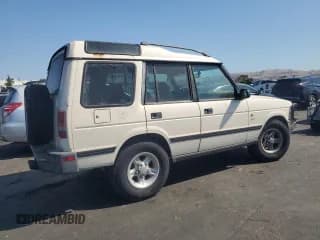 ✅ 1997 Land Rover Discovery SD • VIN: SALJY1244VA555093 • Лот: 64120595. Опубликован ранее на Copart с пробегом 261 167 миль. Бесплатный доступ к архиву аукционных продаж из США и подробный отчёт об истории автомобиля на DreamBid. Изображение 3.