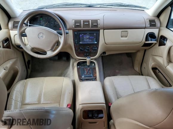 ✅ 2001 Mercedes-Benz M 320/430/500 • VIN: 4JGAB54E71A286387 • Лот: 89500875. Опубликован ранее на Copart с пробегом 197 637 миль. Бесплатный доступ к архиву аукционных продаж из США и подробный отчёт об истории автомобиля на DreamBid. Изображение 8.