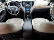 ✅ 2015 Hyundai Santa Fe Limited • VIN: 5XYZUDLA5FG304905 • Лот: 79820484. Опубликован ранее на Copart с пробегом 39 305 миль. Бесплатный доступ к архиву аукционных продаж из США и подробный отчёт об истории автомобиля на DreamBid. Изображение 8.