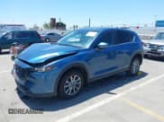 ✅ 2022 Mazda CX-5 S Carbon Edition • VIN: JM3KFBCM4N0584354 • Lot: 42817467. Listed on IAAI with 57,528 mi. Free auction sales archive from the USA and detailed vehicle history report at DreamBid. Image 19.