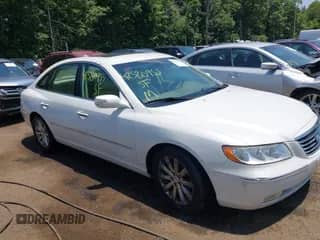 2009 Hyundai Azera Limited z VIN KMHFC46F29A357851, wystawiony jako IAAI lot #42580955 z przebiegiem 143 807 mil mil oraz . Historia ofert i sprzedaży dostępna na DreamBid. Obrazek 1.