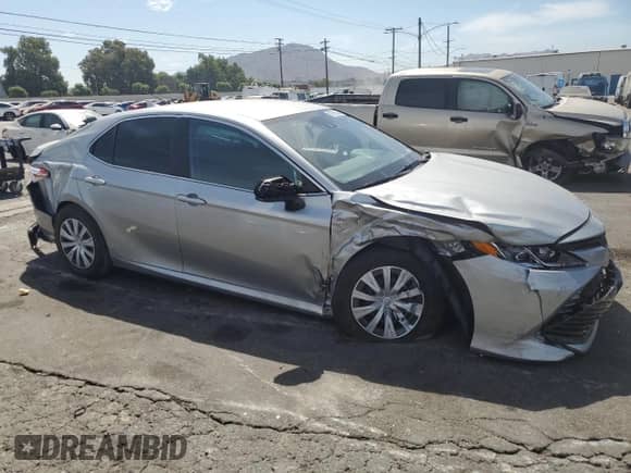 2020 Toyota Camry Hybrid LE with VIN 4T1C31AK8LU013856, listed as a Copart auction lot 69795535 with 44,375 mi miles and Salvage title. Bid and sale history available at DreamBid. Image 4.