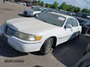 ✅ 2000 Lincoln Town Car Signature • VIN: 1LNHM82W3YY800310 • Lot: 42801252. Listed on IAAI with Not provided. Free auction sales archive from the USA and detailed vehicle history report at DreamBid. Image 2.