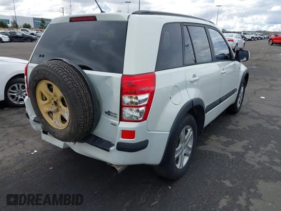 ✅ 2006 Suzuki Grand Vitara Luxury • VIN: JS3TD947064102821 • Lot: 43764244. Listed on IAAI with 122,196 mi. Free auction sales archive from the USA and detailed vehicle history report at DreamBid. Image 4.
