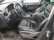 ✅ 2012 Volkswagen Touareg Sport • VIN: WVGEF9BP4CD011854 • Lot: 93265865. Listed on Copart with 143,711 mi. Free auction sales archive from the USA and detailed vehicle history report at DreamBid. Image 7.