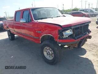 ✅ 1997 Ford F-350 • VIN: 1FTJW36G5VEC23170 • Lot: 42013727. Listed on IAAI with 318,411 mi. Free auction sales archive from the USA and detailed vehicle history report at DreamBid. Image 1.