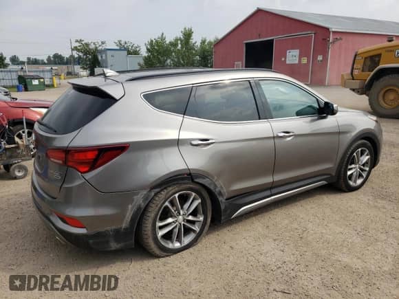 2017 Hyundai Santa Fe 2.0T with VIN 5XYZUDLA1HG403885, listed as a Copart auction lot 65052585 with 172,471 mi miles and Clean title. Bid and sale history available at DreamBid. Image 3.